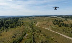 Drone LiDAR mapping a Connecticut development site with varied terrain before construction planning begins
