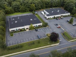 ALTA Title Survey of a Connecticut multi-parcel commercial site with shared parking and connected drive aisles