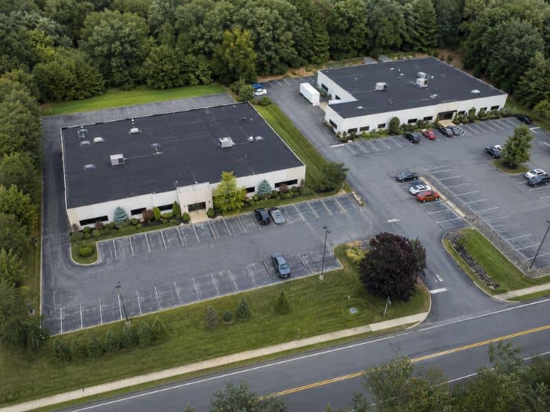 ALTA Title Survey of a Connecticut multi-parcel commercial site with shared parking and connected drive aisles