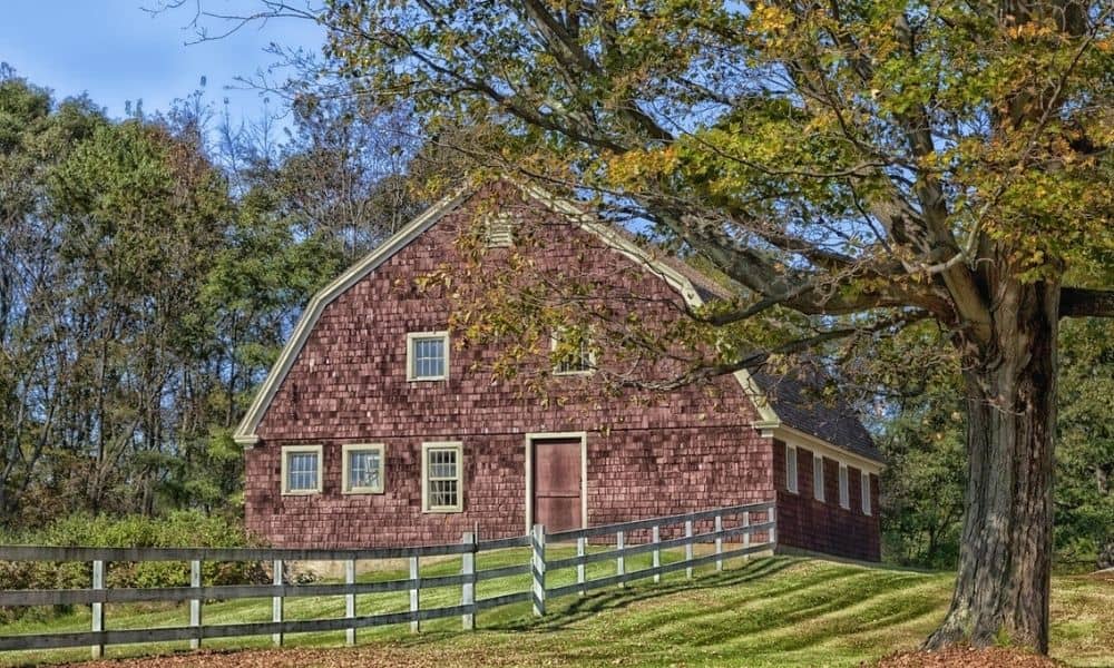 Historic Connecticut farm building and fence relevant to a property due diligence survey